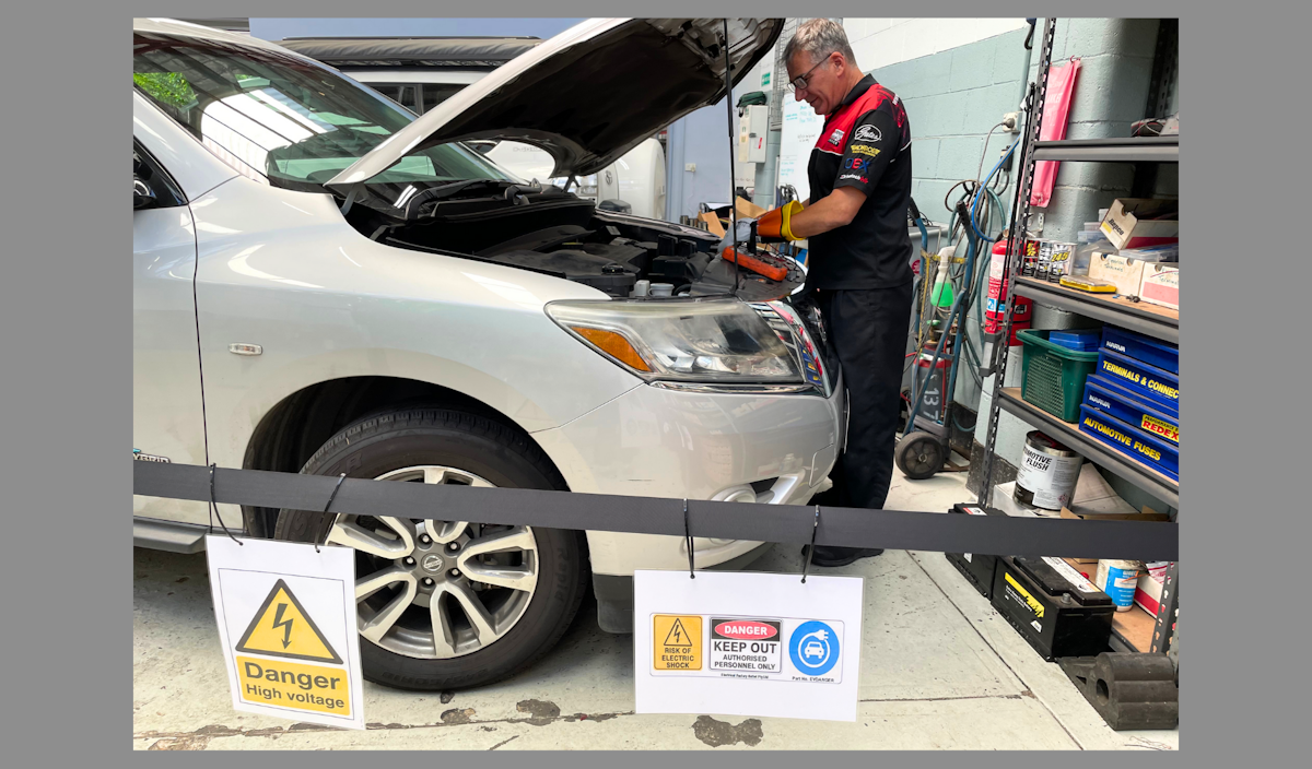 Hybrid Nissan Pathfinder being throughly inspected to diagnose the fault.